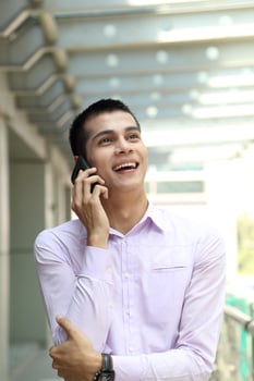 Young south east Asian middle eastern man woman business colleague outdoor stand pose photo