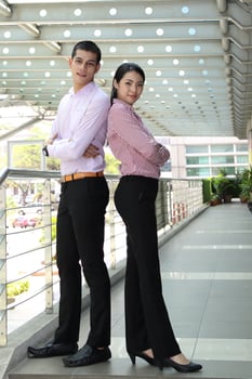Young south east Asian middle eastern man woman business colleague outdoor stand pose photo