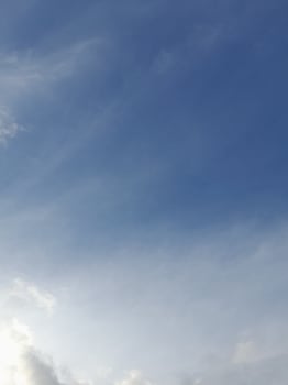 The white clouds on the blue sky are perfect for the background.  Skyscape on Lombok Island, Indonesia photo