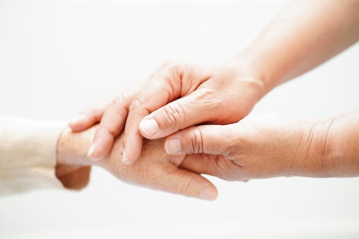 Doctor holding hands Asian elderly woman patient, help and care in hospital. photo