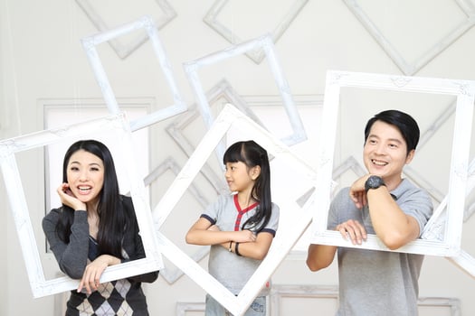 South East Asian young father mother daughter  parent girl child activity indoor photo