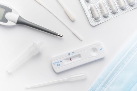 Home testing kit for coronavirus on a white background photo