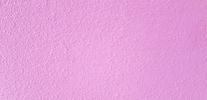 Pink painted Rough or grunge concrete or cement wall for background. Retro wallpaper, pastel, Colorful, Painting and Texture of surface concept photo