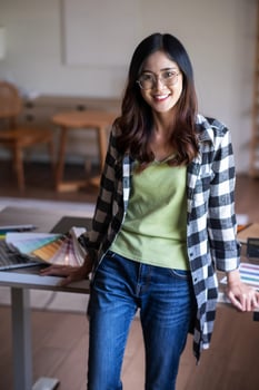 Portrait of female graphic designer in office. photo