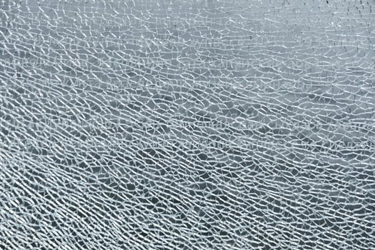 background and texture of broken glass fragments photo