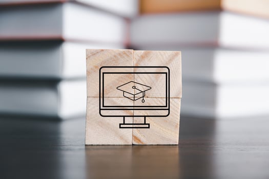 Success and necessary skills in graduation or education. Knowledge and teaching. Wooden cubes with graduation and education symbols linked. education concept. Creative idea and innovation. photo