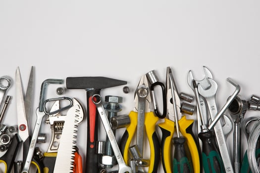 Set of tools for repair in a case on a white background. Assorted work or construction tools. Wrenches, Pliers, screwdriver. Top view photo