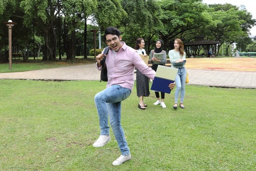 Young asian malay chinese man woman outdoor park  book file folder laptop computer phone sit stand study mingle photo