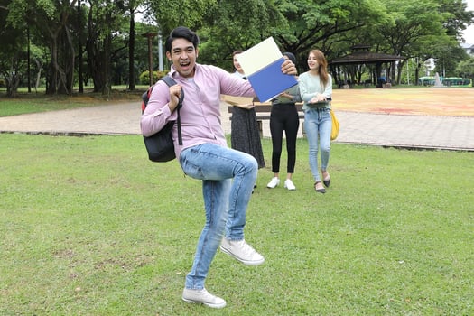 Young asian malay chinese man woman outdoor park  book file folder laptop computer phone sit stand study mingle photo