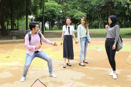 Young asian malay chinese man woman outdoor park walk stand study talk discuss point laptop file book backpack fun play photo