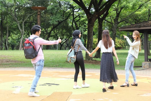 Young asian malay chinese man woman outdoor park  book file folder laptop computer phone sit stand study mingle photo