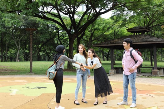 Young asian malay chinese man woman outdoor park  book file folder laptop computer phone sit stand study mingle photo