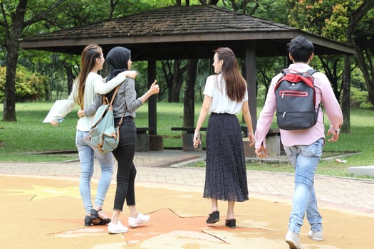 Young asian malay chinese man woman outdoor park  book file folder laptop computer phone sit stand study mingle photo