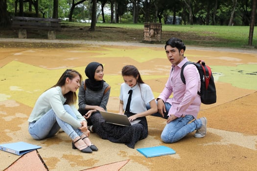 Young asian malay chinese man woman outdoor park  book file folder laptop computer phone sit stand study mingle photo