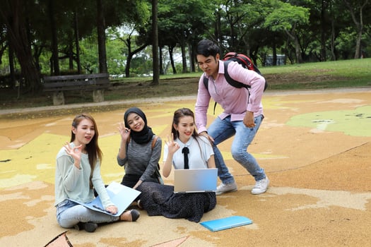 Young asian malay chinese man woman outdoor park  book file folder laptop computer phone sit stand study mingle photo