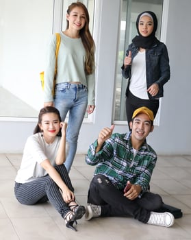 Young asian malay chinese man woman indoor stair corridor campus book file folder laptop computer phone sit stand study mingle photo
