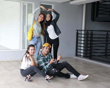 Young asian malay chinese man woman indoor stair corridor campus book file folder laptop computer phone sit stand study mingle happy smile joy photo