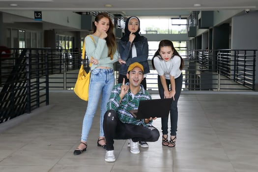 Young asian malay chinese man woman indoor stair corridor campus book file folder laptop computer phone sit stand study mingle happy think idea photo
