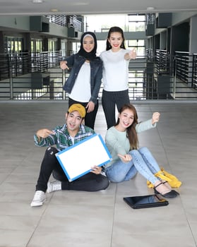 Young asian malay chinese man woman indoor stair corridor campus book file folder laptop computer phone sit stand study mingle photo