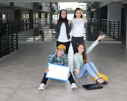 Young asian malay chinese man woman indoor stair corridor campus book file folder laptop computer phone sit stand study mingle photo