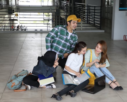 Young asian malay chinese man woman indoor stair corridor campus book file folder laptop computer phone sit stand study mingle photo
