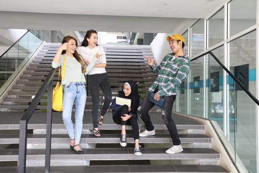 Young asian malay chinese man woman indoor stair corridor campus book file folder laptop computer phone sit stand study mingle photo