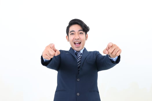 South east Asian Malay Man facial expression happy mouth open look forward at camera pint both hand at camera photo