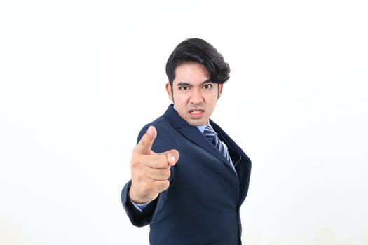 South east Asian Malay Man facial expression angry upset shocked angry upset threat point forward at camera photo