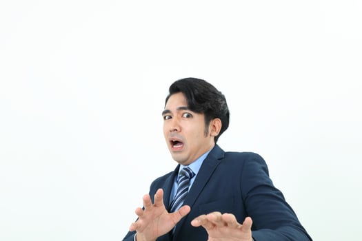 South east Asian Malay Man facial expression shocked scared afraid hand in front self protect photo