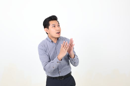 South east Asian Malay Man facial expression surprised shocked afraid pleading photo