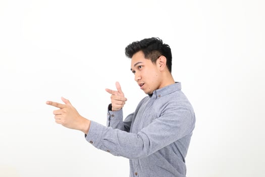 South east Asian Malay Man facial expression show point finger both hand photo