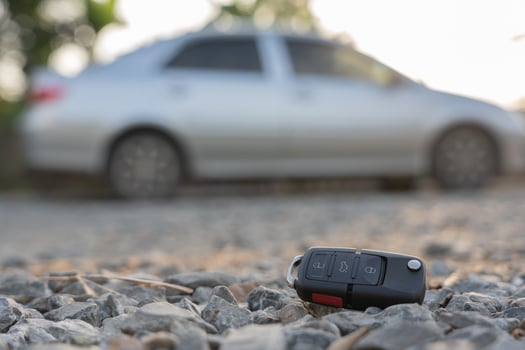 Lost car keys on the ground, Car keys dropped on the floor or fall lying on the street home front. Walking Away From Lost Car Key, can not transport, express, rush time, wast time, emergency photo