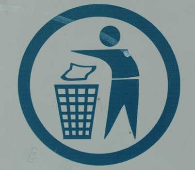 the sign abandons the garbage on white ground photo