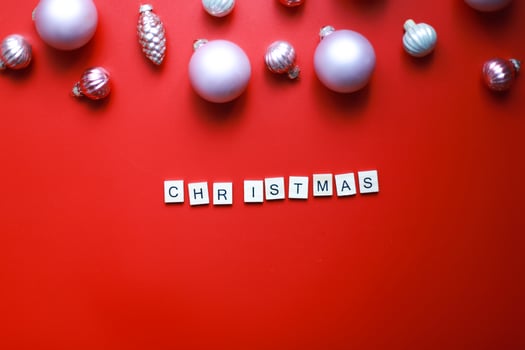 Flat lay word christmas from wooden letters. Flatly Christmas toys for the Christmas tree photo
