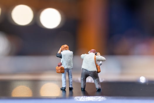 Miniature people Photography holding a camera and copy space for text photo