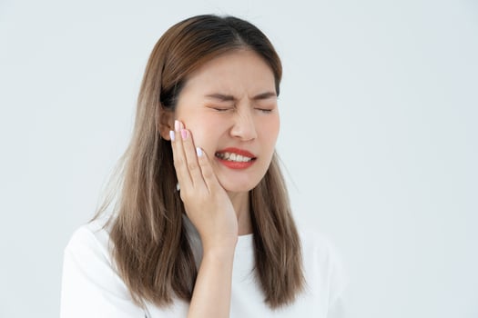 Asian woman feel toothache from gingivitis, female suffer tooth, decay problems, dental care. sensitive tooth, decay problem, bad breath, Gingival Recession, Oral Hygiene instruction, tooth extraction photo