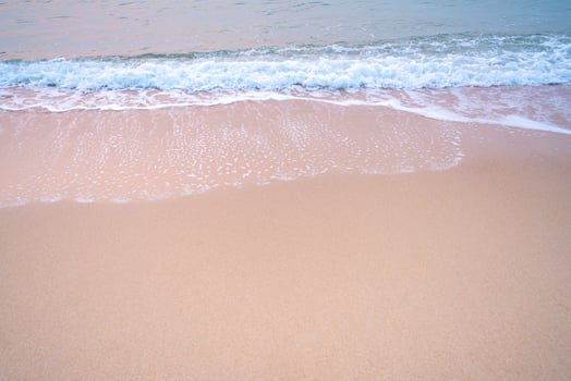 White foam and brown sand. at the sea of Thailand, Empty sea floor and beach with copy space photo