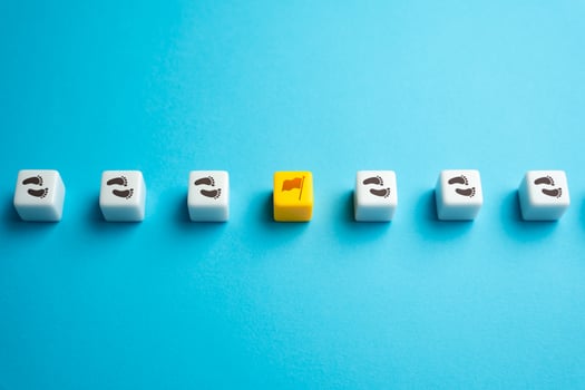 Complete a milestone. Achieve an intermediate goal. Progress mark. Each step brings closer to destination. Progress and success are achieved by taking one small step at a time. photo