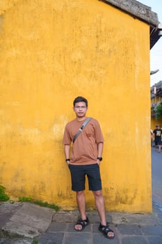 happy traveler traveling at Hoi An ancient town in Vietnam,. landmark and popular for tourist attractions. Vietnam and Southeast Asia travel concept photo