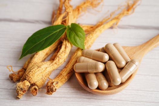 Ginseng roots and green leaf, healthy food. photo