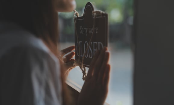 Welcome. Open. barista, waitress woman turning open sign board on glass door in modern cafe coffee shop ready to service, cafe restaurant, retail store, small business owner, food and drink concept photo