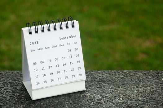 September 2023 table calendar with customizable space for text. Copy space and calendar concept. photo