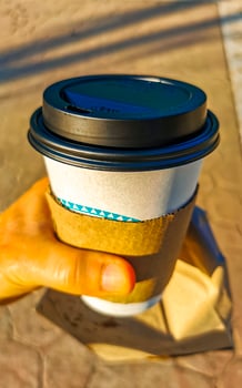Coffee to go mug in the tropical maxican nature place. photo