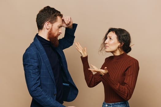 Man and woman couple in a relationship quarrel, yelling, psychological violence in the family, problems in a real relationship between people photo