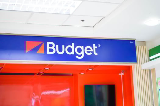 Chiangmai City, CM, 2022, - Closeup and crop business banner of Budget Car Rental in Chiangmai international airport. Budget Rent a Car is an American car rental company. photo
