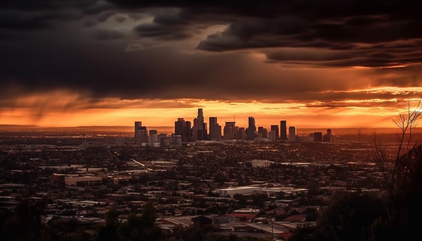 Silhouette of skyscrapers against dramatic sunset sky generated by AI photo