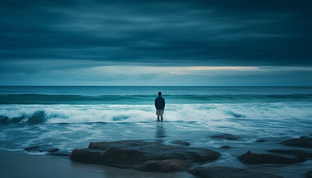 Solitude on the coastline, one person standing generated by AI photo