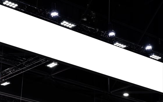 Hanging white indoor billboard with spot light photo