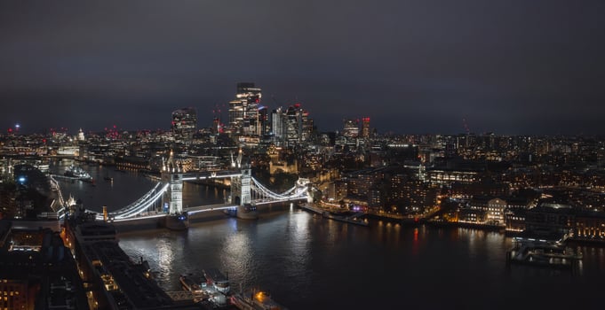 Aerial night view of the Tower Bridge in London. photo