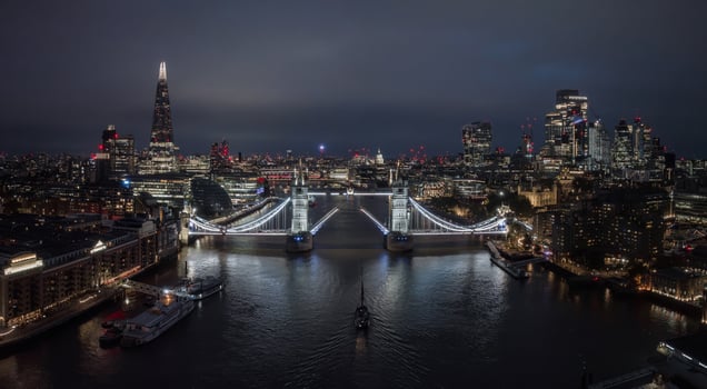 Aerial night view of the lifting up Tower Bridge in London. photo